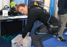Bas Wagemaker demonstrates Laevo's exoskeleton to prevent back pain.